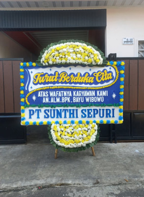 Papan Bunga Duka di Wama
