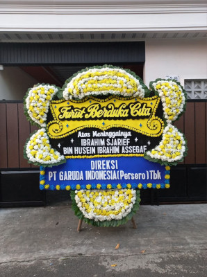 Papan Bunga Duka di Wama