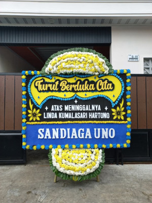 Papan Bunga Duka di Wama