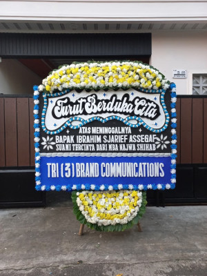 Papan Bunga Duka di Wama